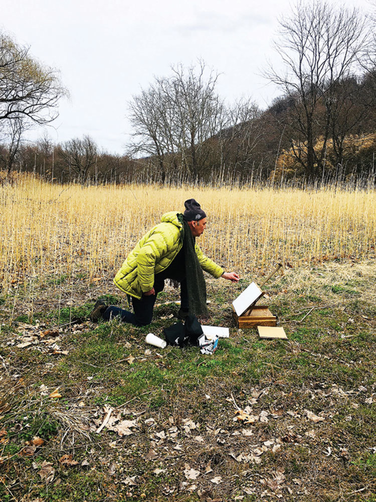 Brian Gormley, painting a field at the turn of the Delaware River at Kintnersville. Members of the Lenni Lenape tribe camped at that field. (Noreen Gorman)