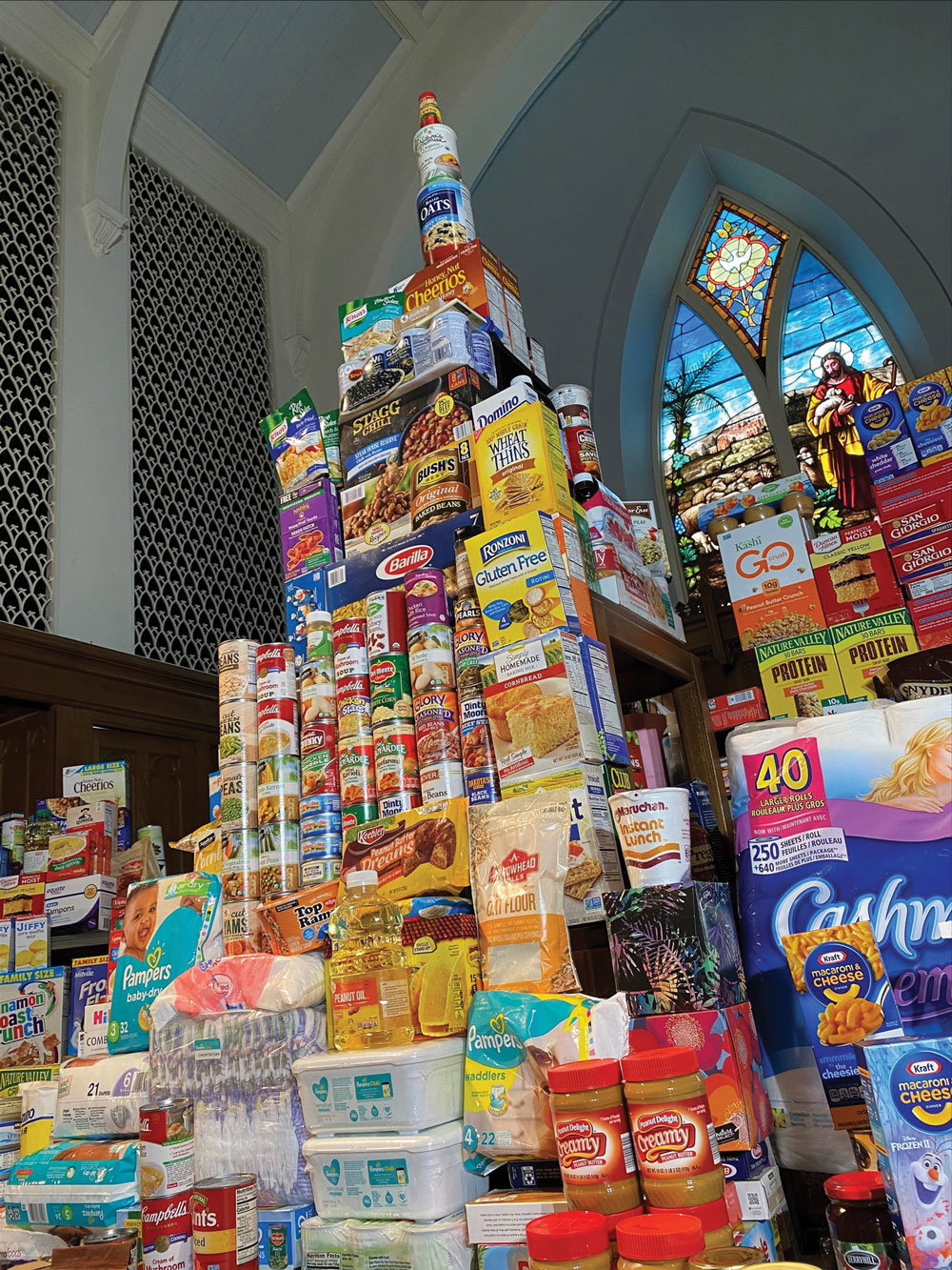 A mountain of food was donated after Salem Church in Doylestown asked neighbors to help those in need. (Peyton Petty)