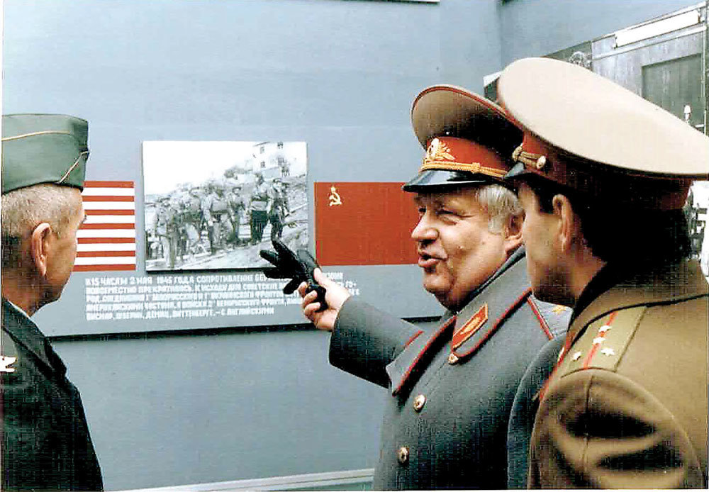 A Russian officer briefs Colonel David R. Kiernan during a tour of Russia after the fall of the Berlin Wall.