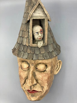 “Shelter” is a clay sculpture by Jeanine Pennell.