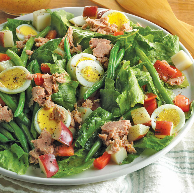 Nicoise salad, named for the city of Nice, France, where it originated, is a pleasant spring salad that is hearty enough for a meal. (Tasteofhome.com)