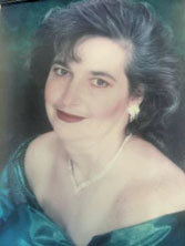 MARGARET E. ”PEGGY” LACEY