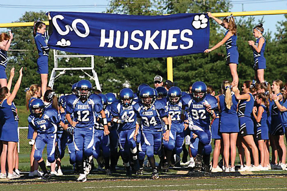 A 2009 Hunterdon Huskies team takes the field. The Huskies are celebrating their 50th anniversary as an organization this year.