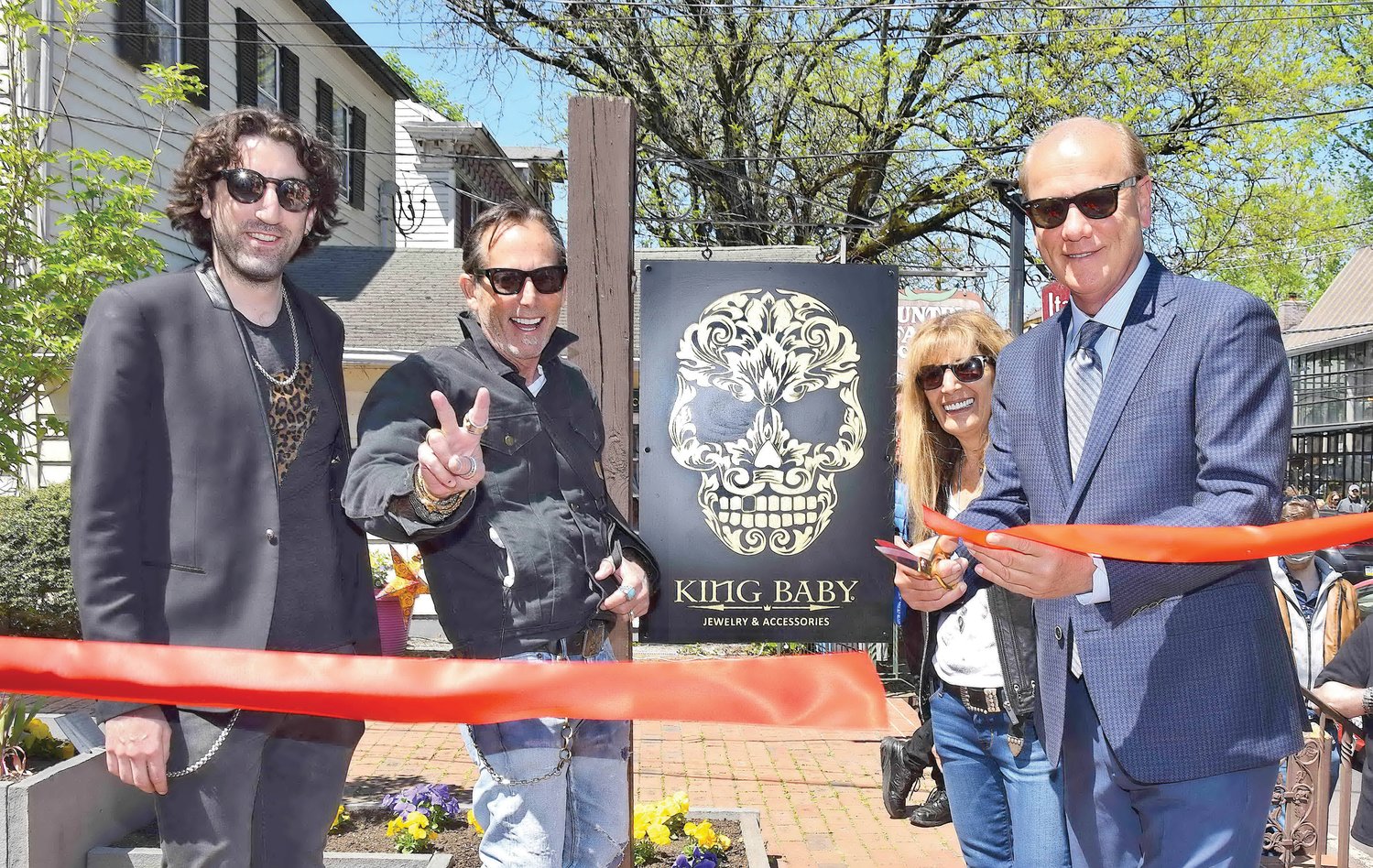 Designer Mitchell Binder, Ilana Bruck, Dan Bruck and New Hope Mayor Larry Keller take part in the ribbon cutting for the grand opening of King Baby.