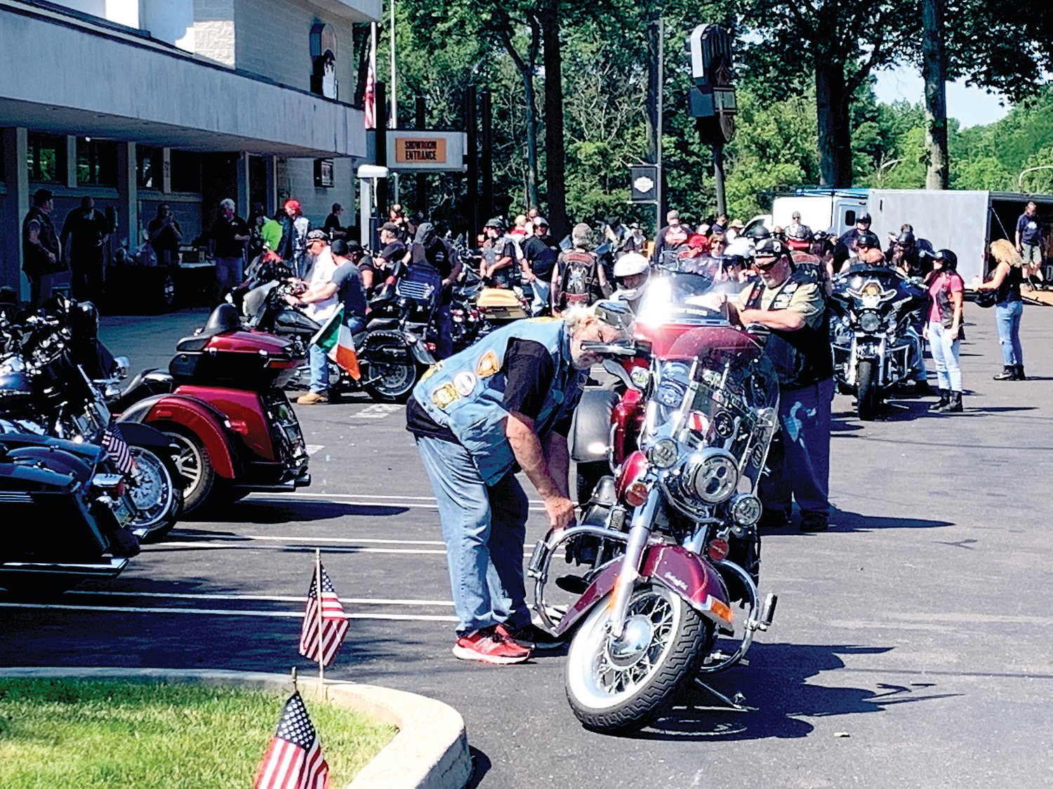 Bikers gather together at the Stars & Stripes Harley-Davidson in Langhorne before the ride.