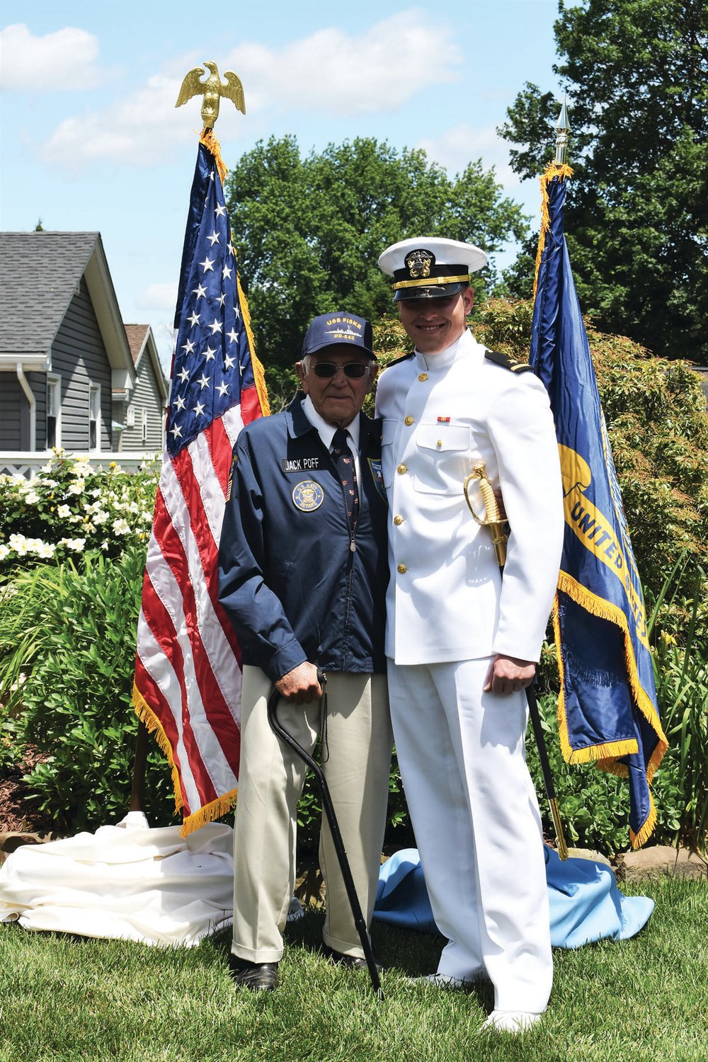 U.S. Naval Officer Nathanael Lee Poff with his grandfather, Navy veteran Jack Lee Poff.