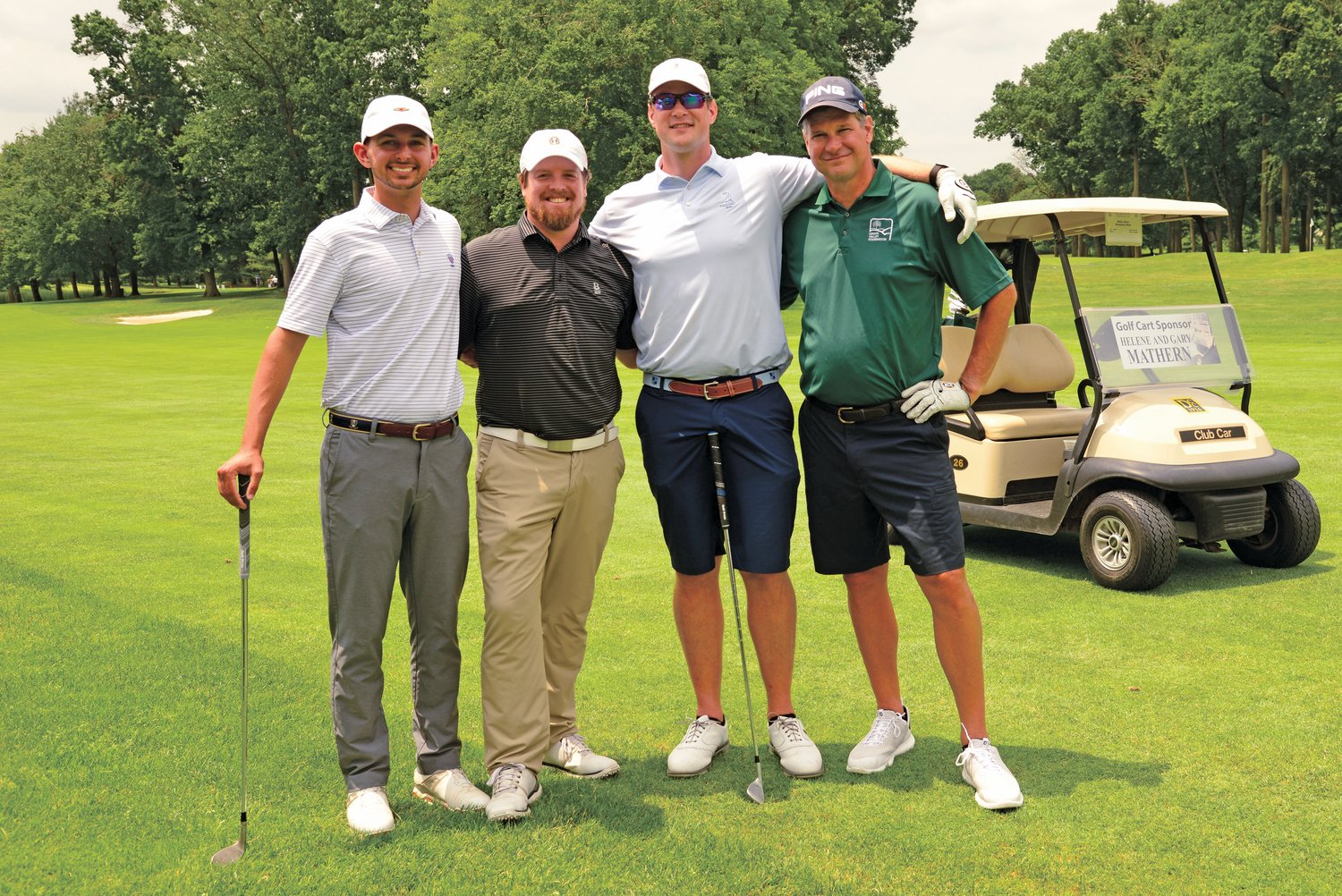 The first-place golf foursome: from left, Jerry Haftmann, Oliver White, Brian Ehresman and John Ehresman.