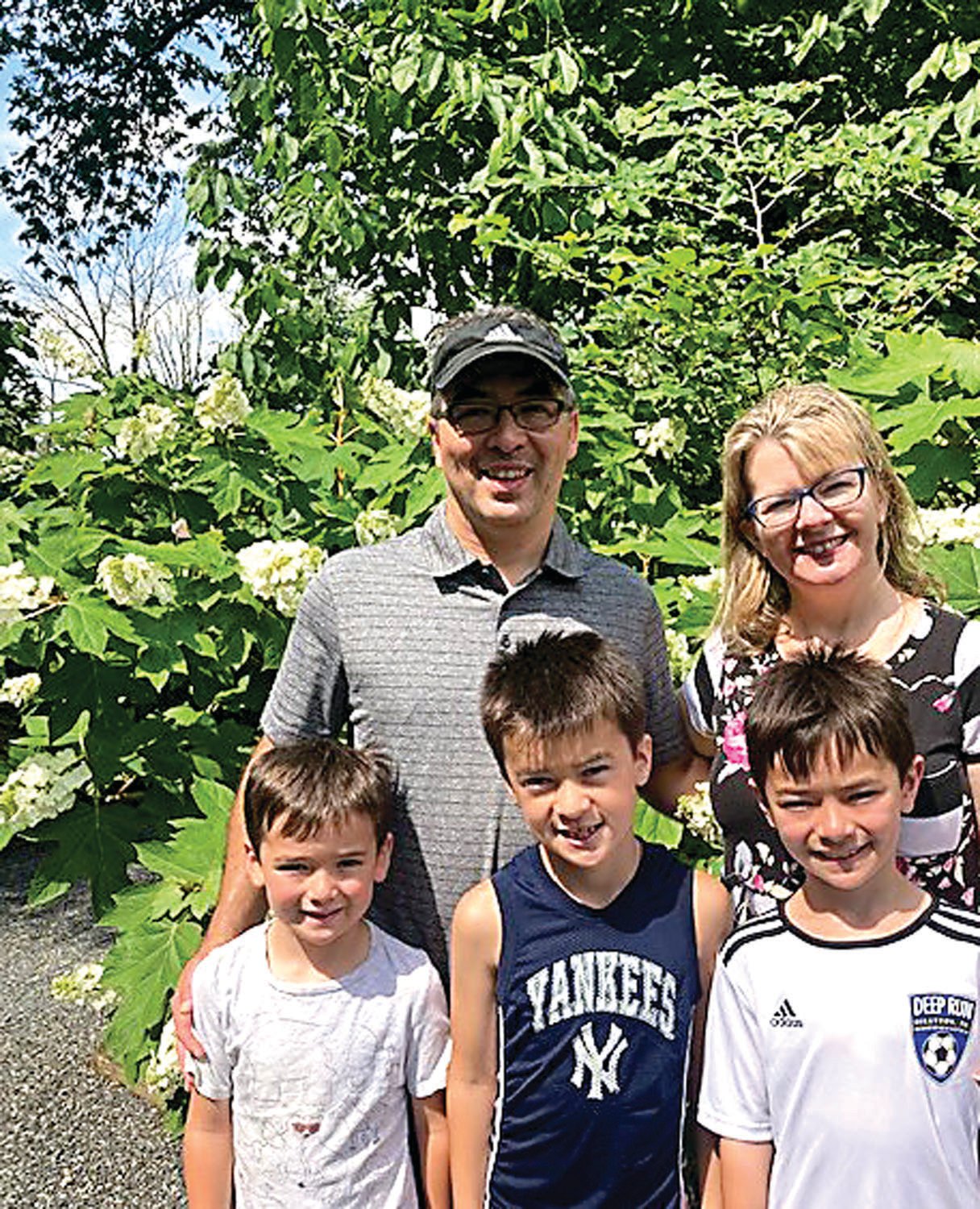 Eric and Mary Nogami, sons Ryan, Ben and Cole, in the Edling-Malinauskas Garden.