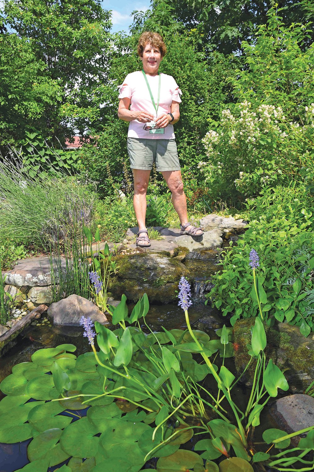 Wendy Margolis by her pond  and garden.