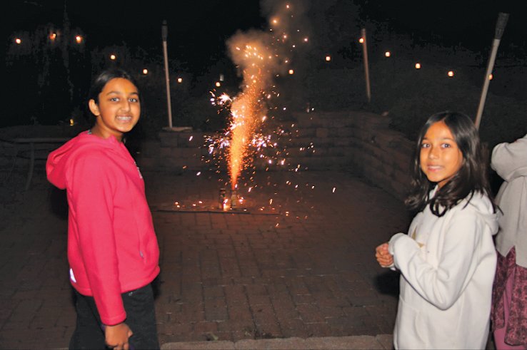 New Hope-Solebury School District student Nikita Tayal, right, and her sister, Ayesha, celebrate Diwali.