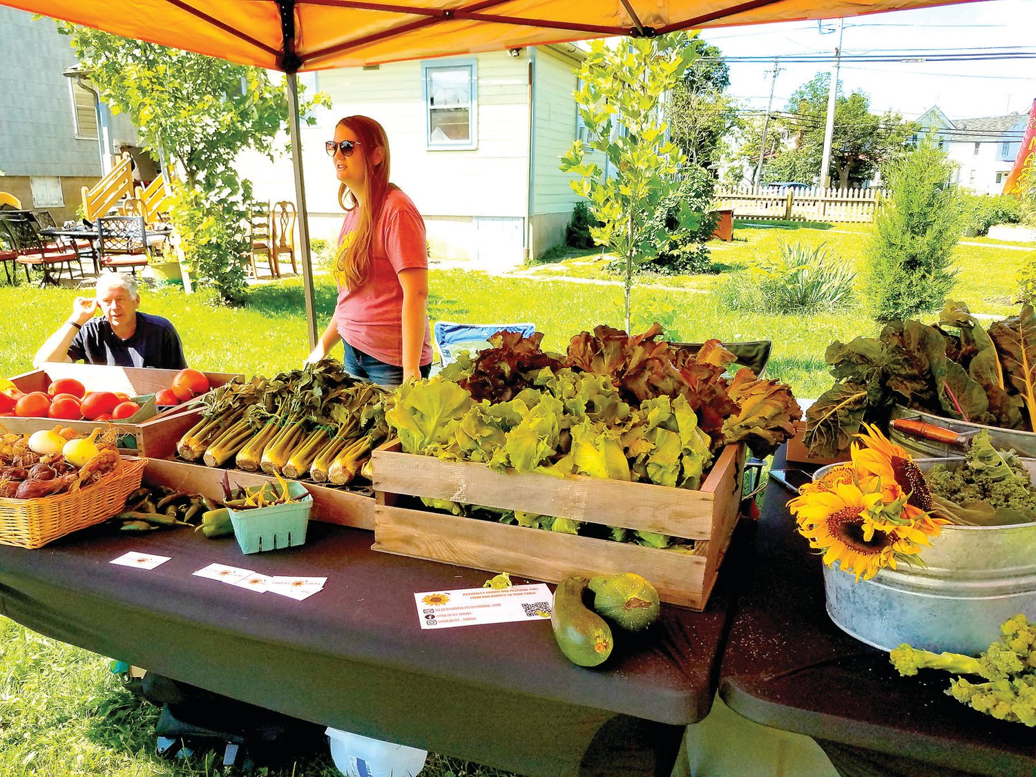 Each Saturday Kaitlyn Gilbert of Gilbert Grove farm sells the produce she and her husband, Bob, grow at the Plumsteadville Grange Farmers Market.