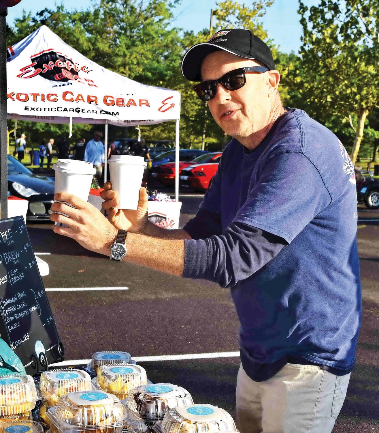 Rob Roman receives his coffee.