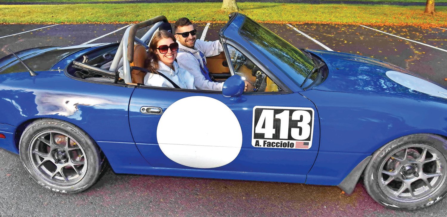 Anthony and Clave Facciolo in their 1990 Mazda Miata.