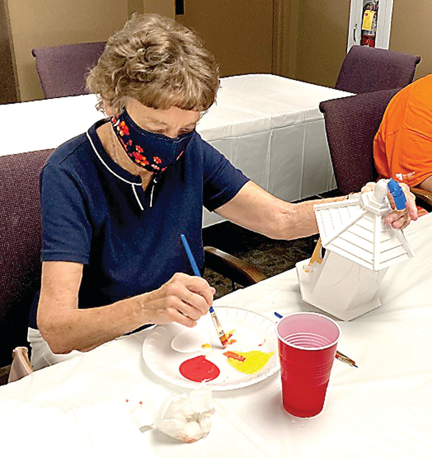 A participant in the “Creative Painting, Design a Summertime Birdhouse” workshop, presented by visiting artist Antoinette Marchfelder as part of the 2021 Summer Education Series for Lifelong Learning.