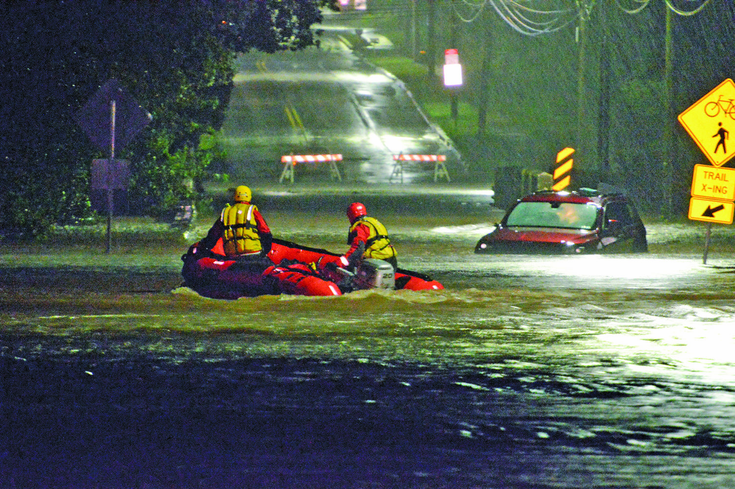 The Bucks County Technical Rescue Task Force, joined by Perkasie and Lower Southampton fire departments, take part in a water rescue caused by flooding from the East Branch of the Perkiomen Creek at Callowhill Road and Dorchester Lane, Perkasie.