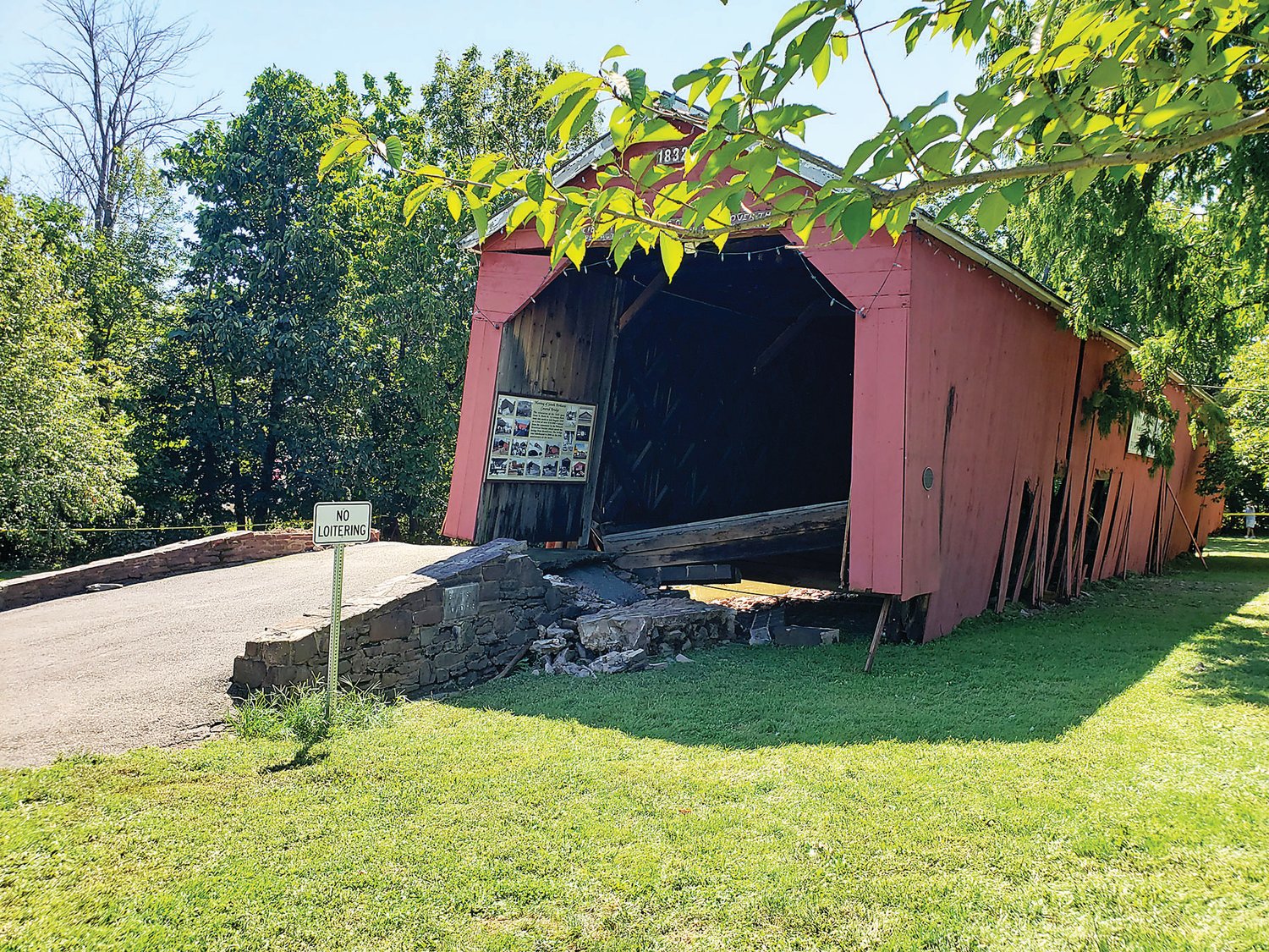 The South Perkasie Covered Bridge, constructed in 1832, was pushed off its abutments by flood waters.