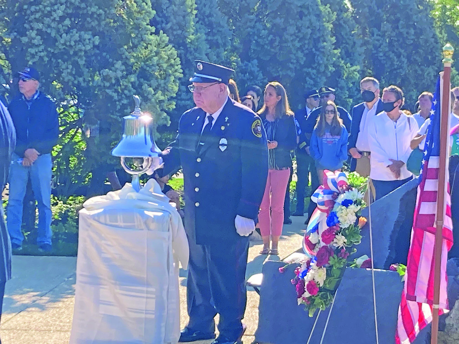 Navy veteran and Yardley-Makefield Fire Company member Lawrence Schwalm rings a bell at a morning ceremony in Lower Makefield Saturday marking 20 years since the Sept. 11, 2001 terrorist attacks.