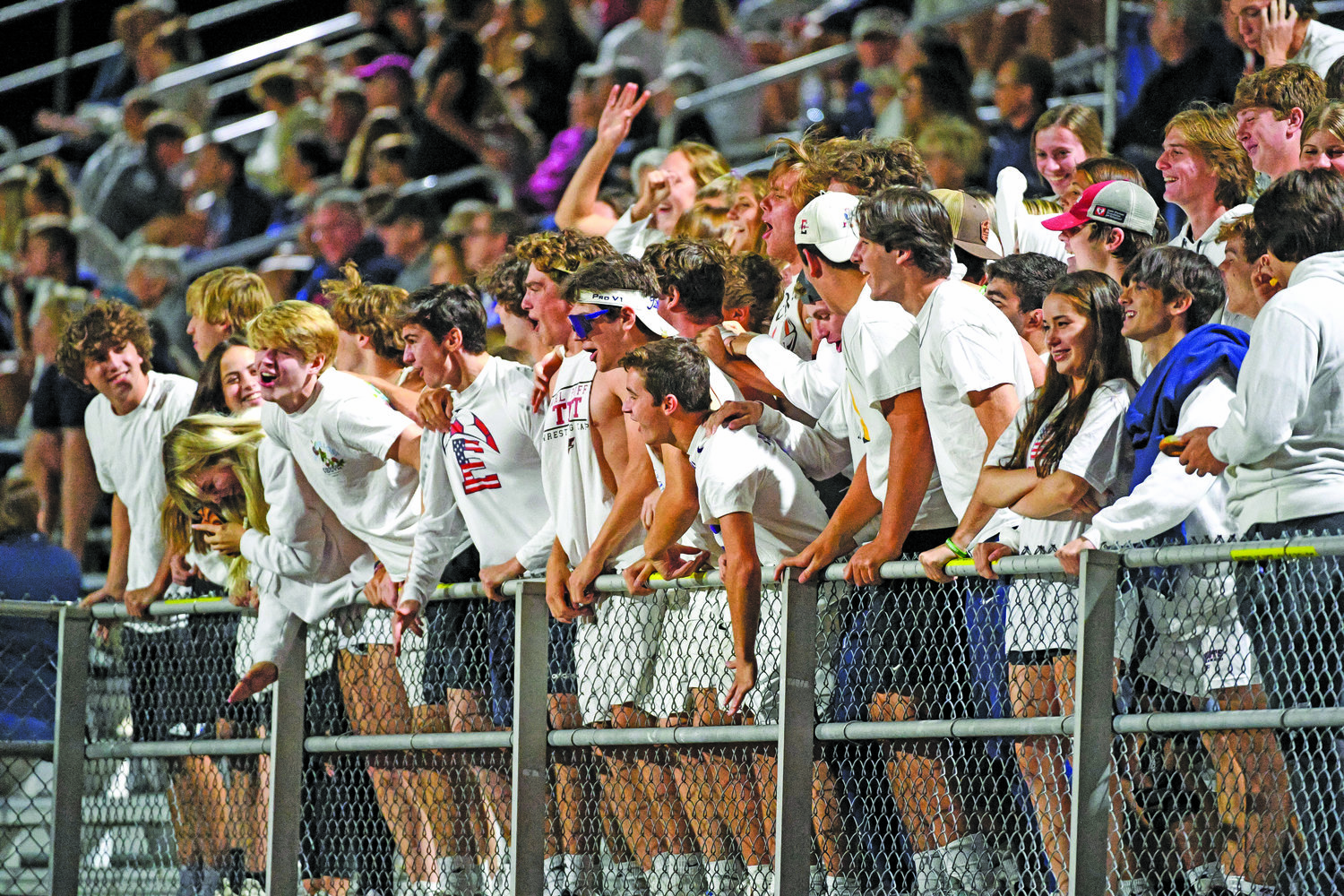 The CB East student section celebrates the first goal of the game by Trevor Jopling.