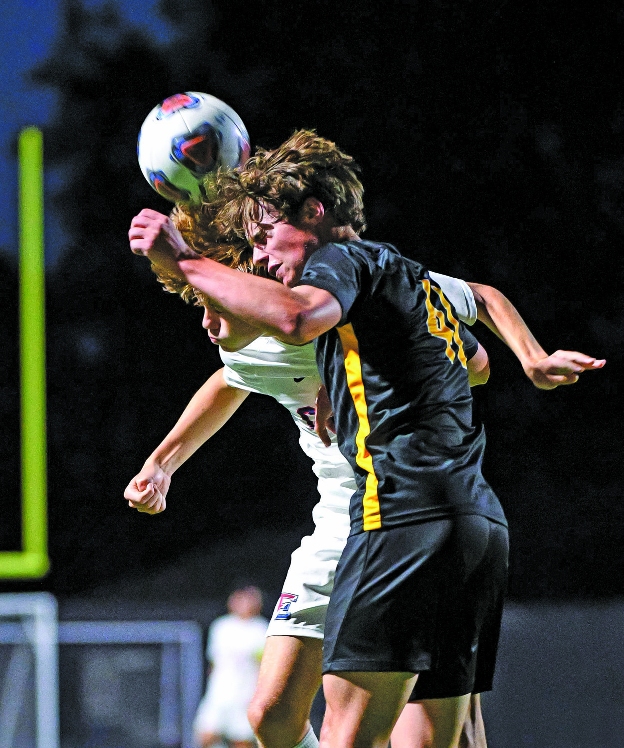 CB East’s Michael Montabana and CB West’s Joe Dowd battle for a header.