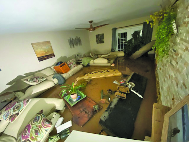 Hurricane Ida’s flood waters raced into the home of Rob and Nicole Rothdeutsch on Red Bridge Road upending appliances and furniture and reaching the top of the kitchen island.