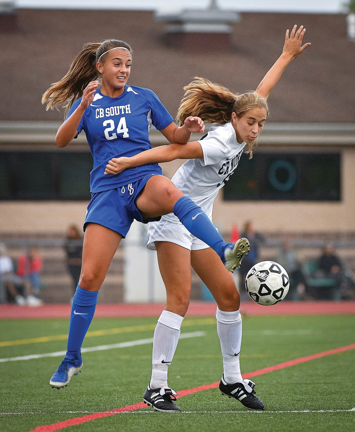 CB South’s Holly Joseph and CR North’s Mia Cairone battle for a loose ball.