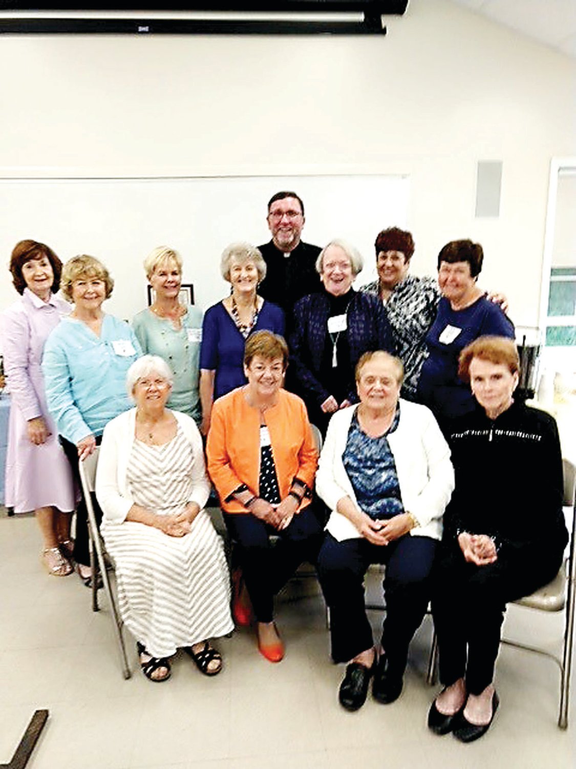 From left, top row, are: Mary Ellen Stanton; Berni Padva, co-chair; Mary Jane Murnane; Yvonne Lorenz; the Rev. Christopher Walsh; Pat Hackett; Deb Nerviano, co-chair; and Pamela Good; and bottom row, Sue Benzie, Maureen Casey, Barb Petrone, and Mary Lou Gehring.