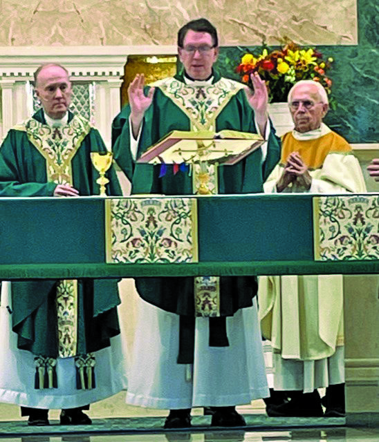 From left are the Most Rev. Michael J. Fitzgerald, auxiliary bishop of Philadelphia; the Rev. Matthew W. Guckin, pastor of Our Lady of Mt. Carmel, Doylestown; and the Rev. Monsignor Philip C. Ricci, pastor emeritus, Mary Mother of the Redeemer, North Wales.