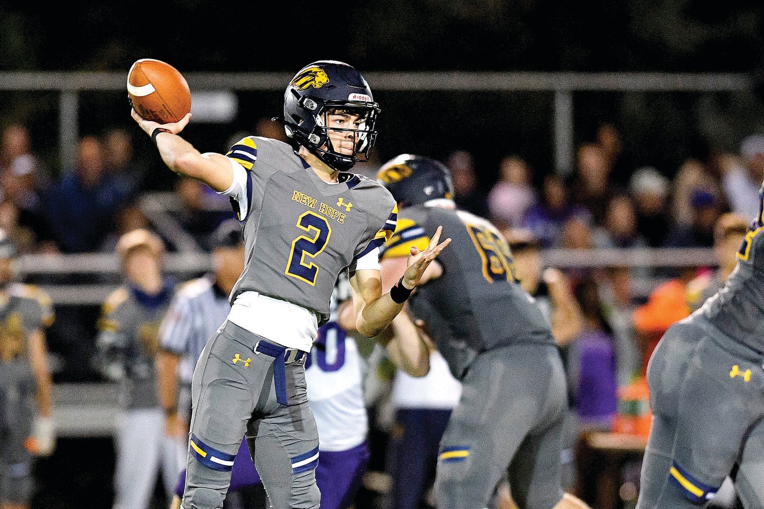 New Hope quarterback Sean Cooney looks to pass during Upper Moreland’s 41-14 win.