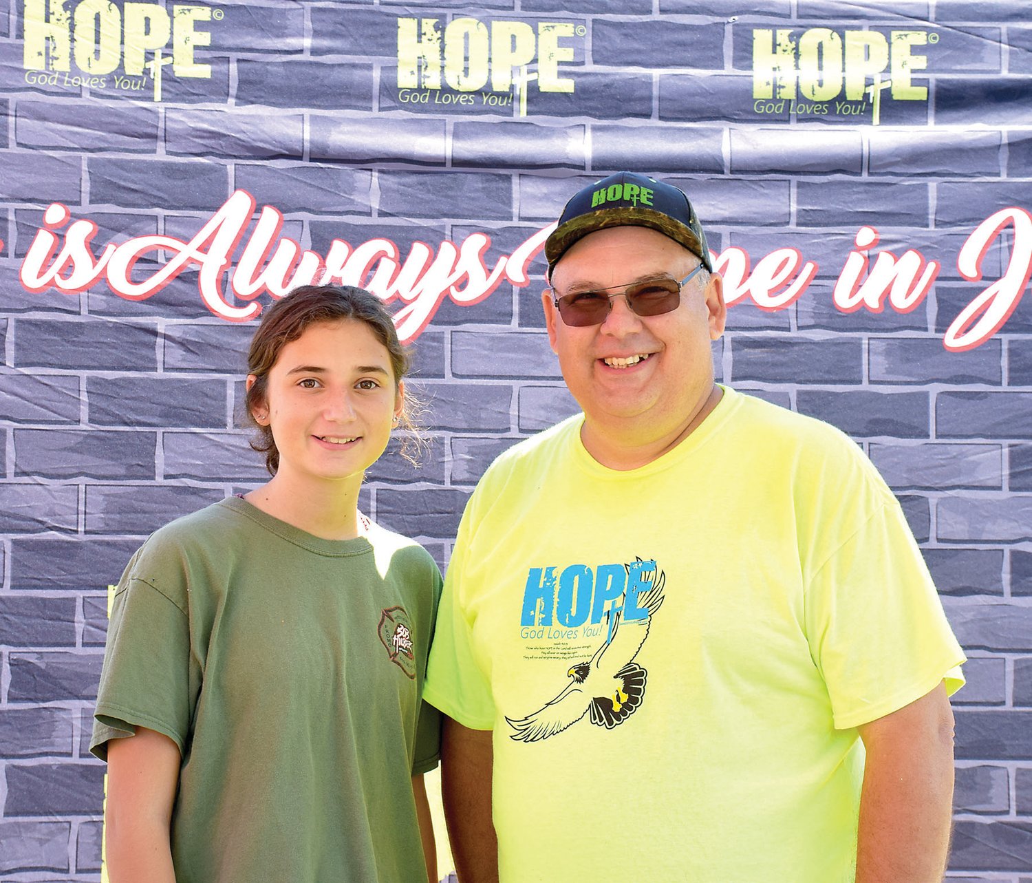 Brad Edenfield of Executive Promotions and his daughter, Rachel, overseeing Sweatshirt of Hope.