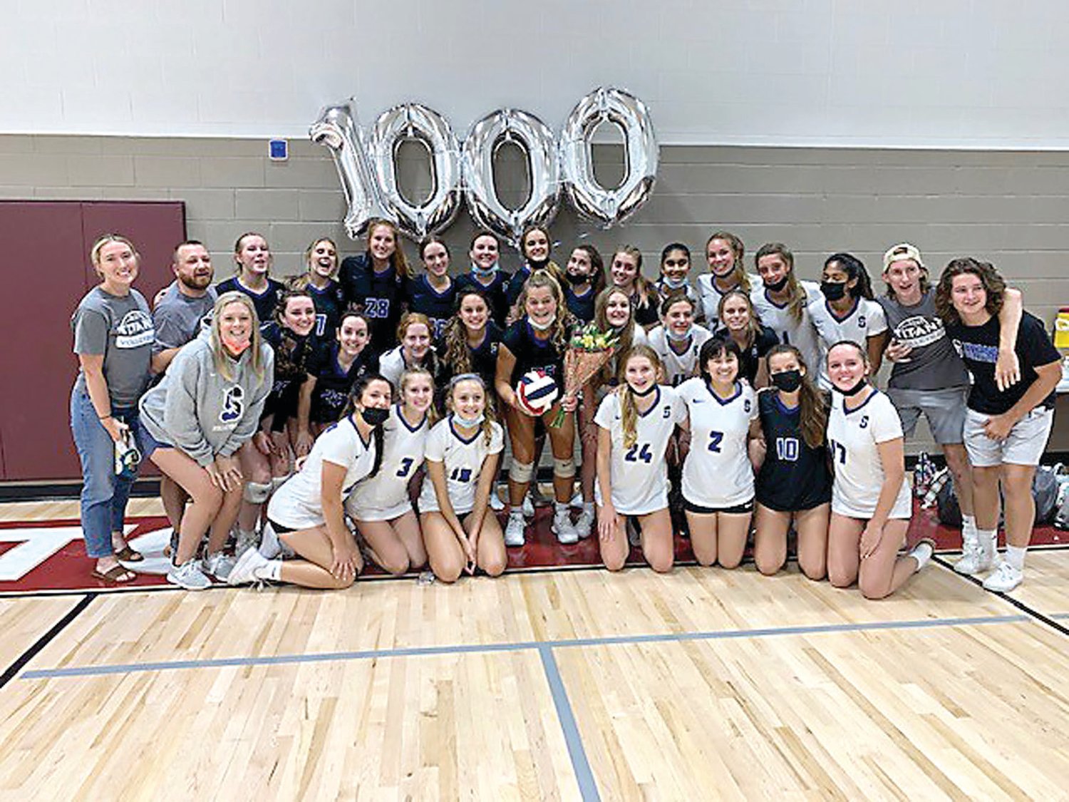 Millie Grove celebrates reaching the 1,000-kill milestone with the CB South girls volleyball team.