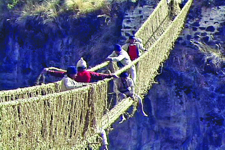 People from communities in the province of Canas, Peru, harvest a local grass, make small cords by twisting together the grass, twist them together to form a larger rope, and then braid them to create the main cables for the bridge.