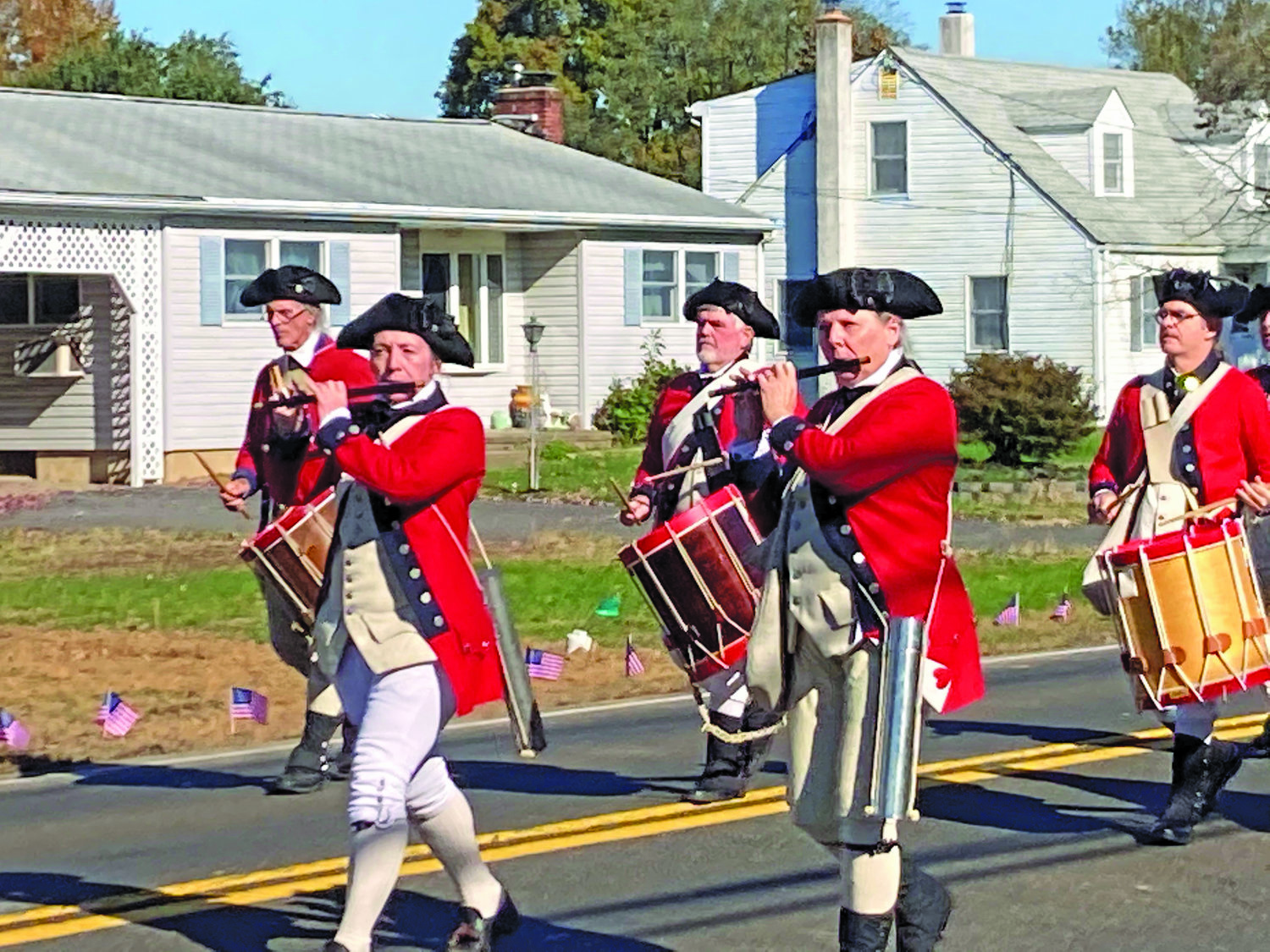 A fife and drum corps marches during the Lower Makefield Township Veterans Day Parade.