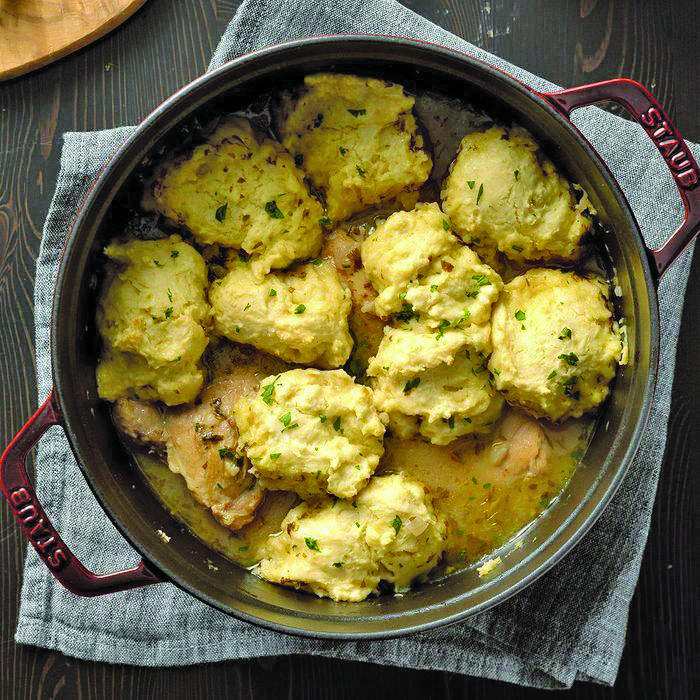 Traditional chicken with dumplings gets an extra zip of flavor from the addition of apple cider, a favorite beverage this time of year.