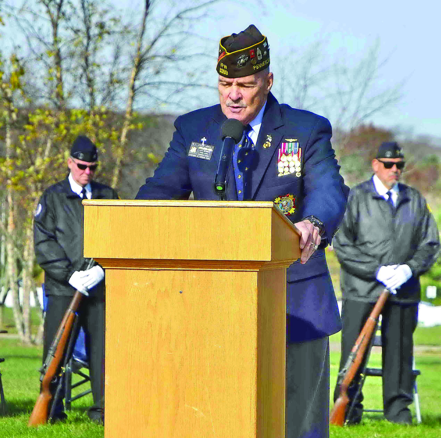 The Rev. Chuck Arnold, life member of Post 6393 Pennsylvania Veterans of Foreign Wars, delivers the opening benediction at the beginning of the ceremony.