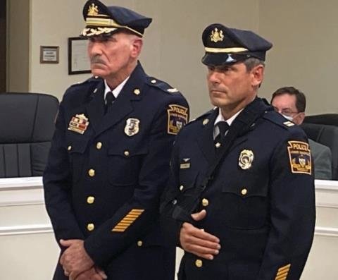 Lower Makefield Township’s first-ever Deputy Police Chief Robert Lewis, right, stands with Chief Ken Coluzzi at the Nov. 17 township supervisors meeting where Lewis’ promotion from captain was celebrated.