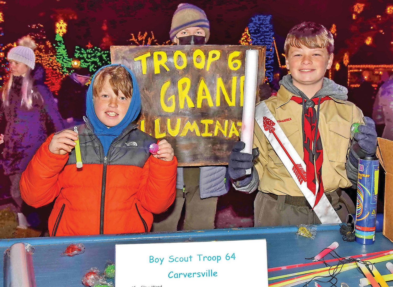 Boy Scouts from Troop 64, Carversville, provided light sticks.
