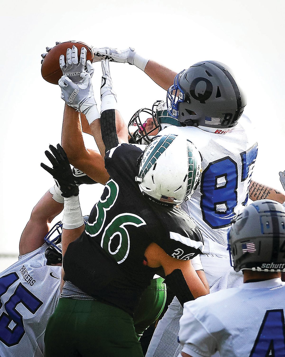 Pennridge holds Quakertown from scoring with a jump ball interception from the Rams’ Sam Kuhns, center (hands on the ball).