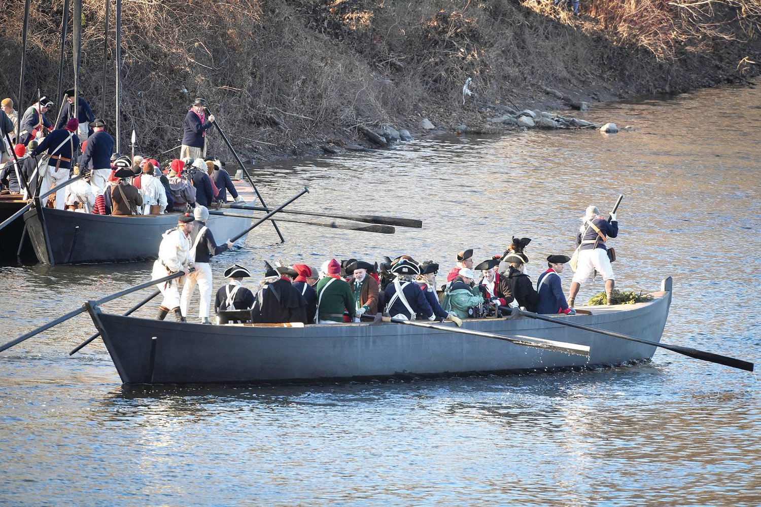 The boat containing Gen. George Washington and Fox News’ Pete Hegseth begins to cross the Delaware River.