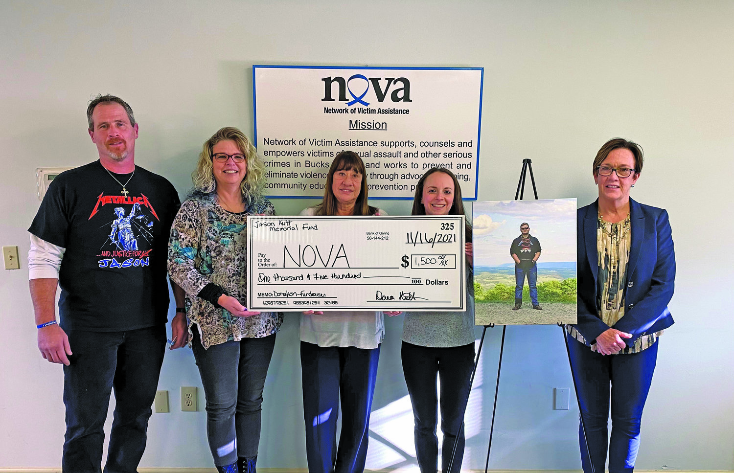 Network of Victim Assistance (NOVA) receives a $1,500 donation from the Kutt family following the Jason Kutt Annual Car Meet. From left are Ronald (Ron) Kutt, Dana Kutt, Susan Bizon, Jill Mann, and Penny Ettinger.