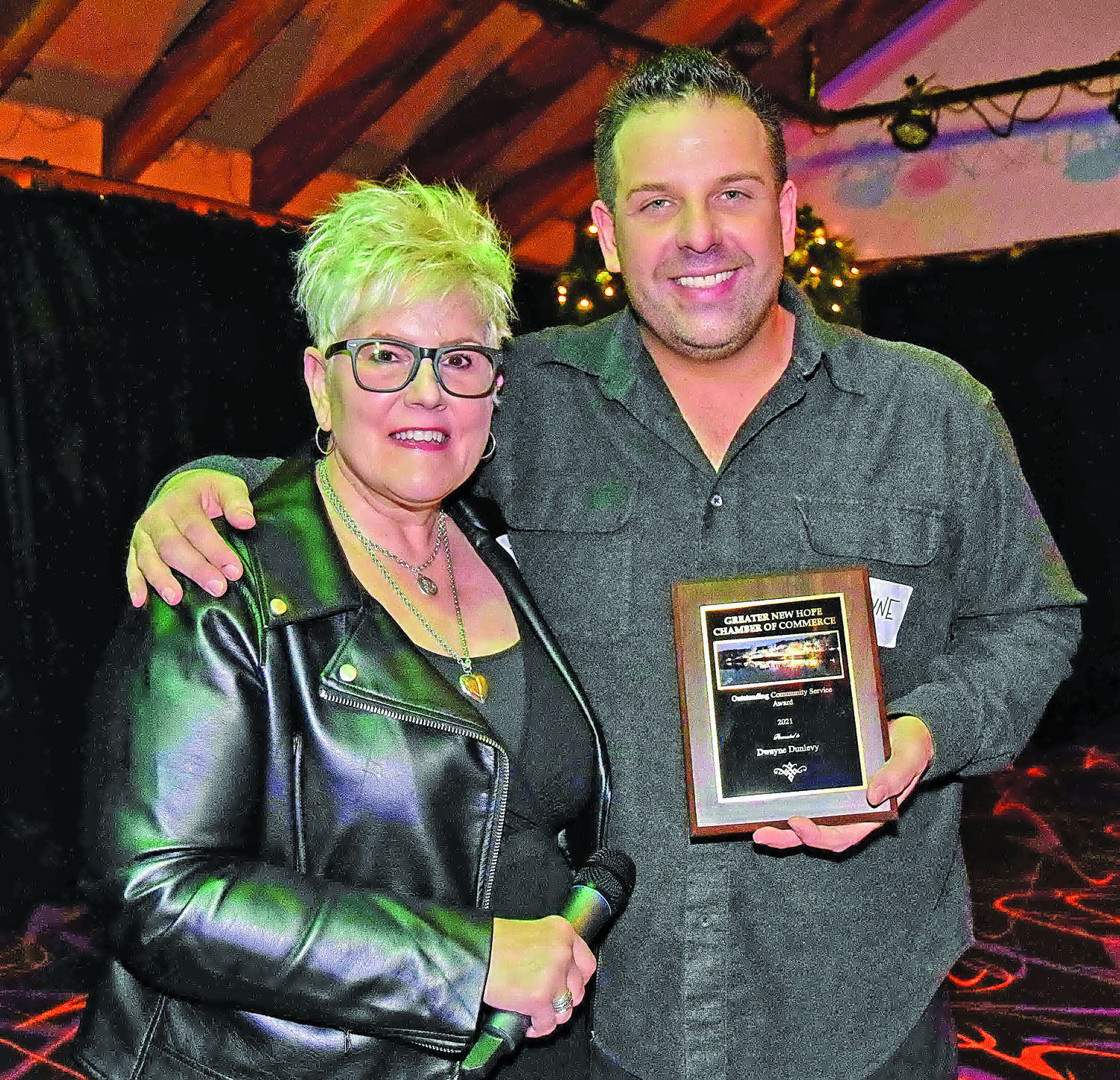 Entertainer Dwayne Dunlevy receives the Outstanding Community service award.