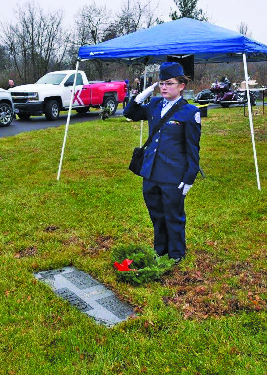 A North Penn Junior ROTC Cadet salutes.
