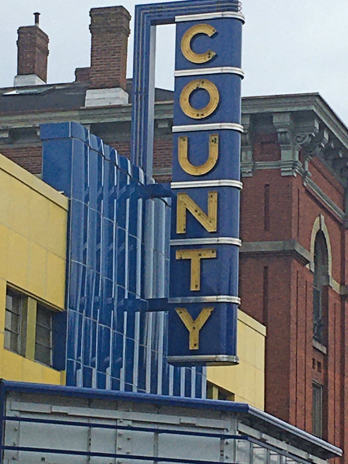 The nonprofit County Theater in Doylestown, which has been closed for a year during construction, raised its restored sign aloft in later February as renovations and expansion close in on the finish.