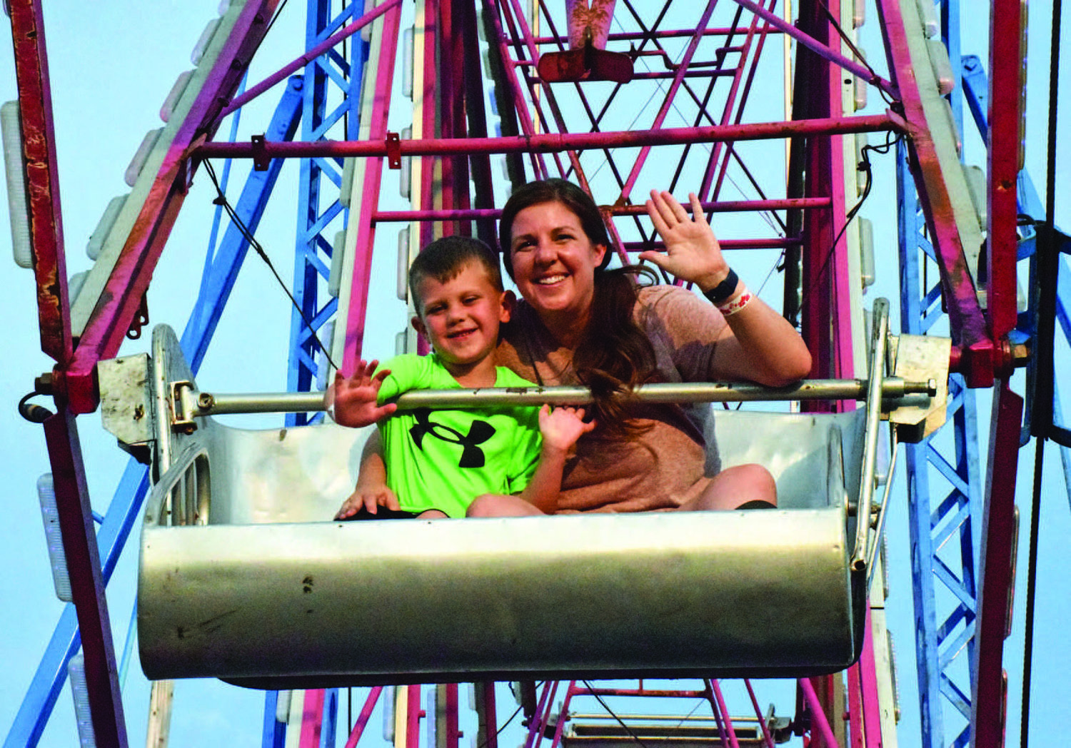 July: Heather McKiernan of Hilltown rides the Ferris wheel with her son, Rowan, at the Sellersville Fire Department carnival.