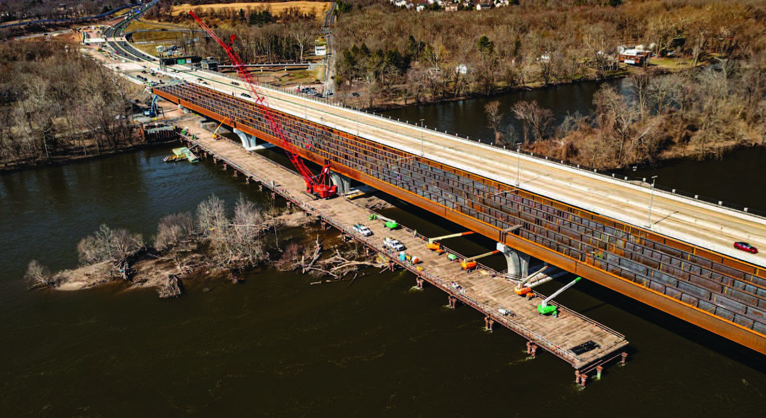 The Scudder Falls Bridge Replacement project along I-295 in New Jersey and Pennsylvania reached a major milestone March 16, when the last of 98 steel support girders was lifted and secured into place.