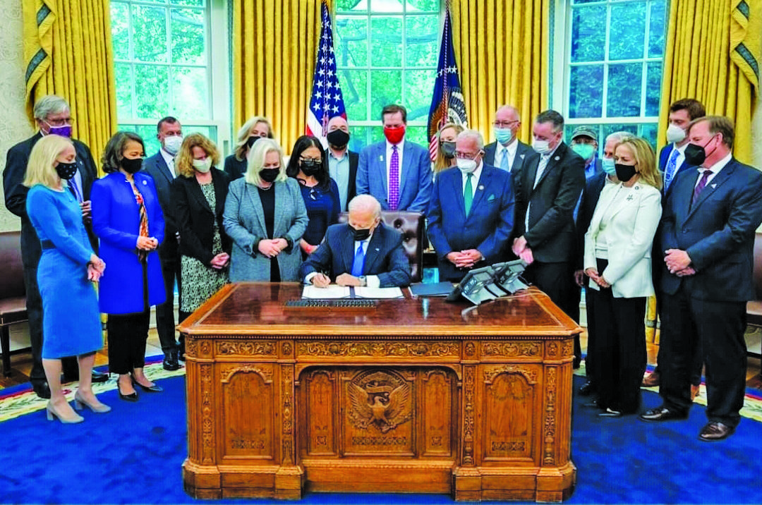 October: Supporters of legislation designating the September 11th National Trail surround President Biden as he signs the legislation authorizing the trail, which will pass through Bucks County’s Garden of Reflection.