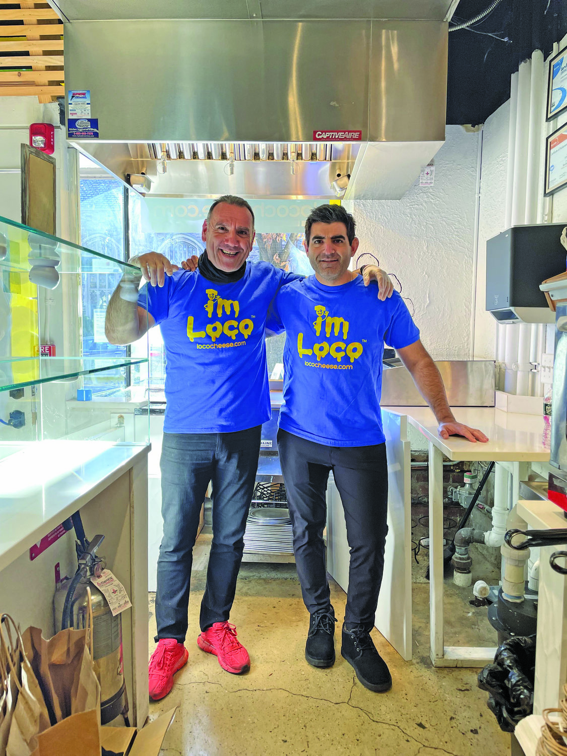 Local Greek owner Anthony Kanterakis, left, and chef Stratos Karabasis.