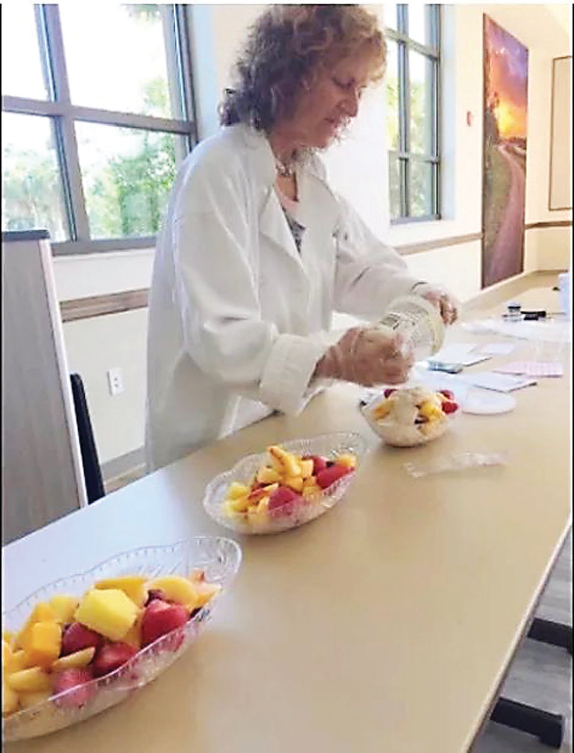 Susan Cohen prepares food as part of her cooking instruction business.