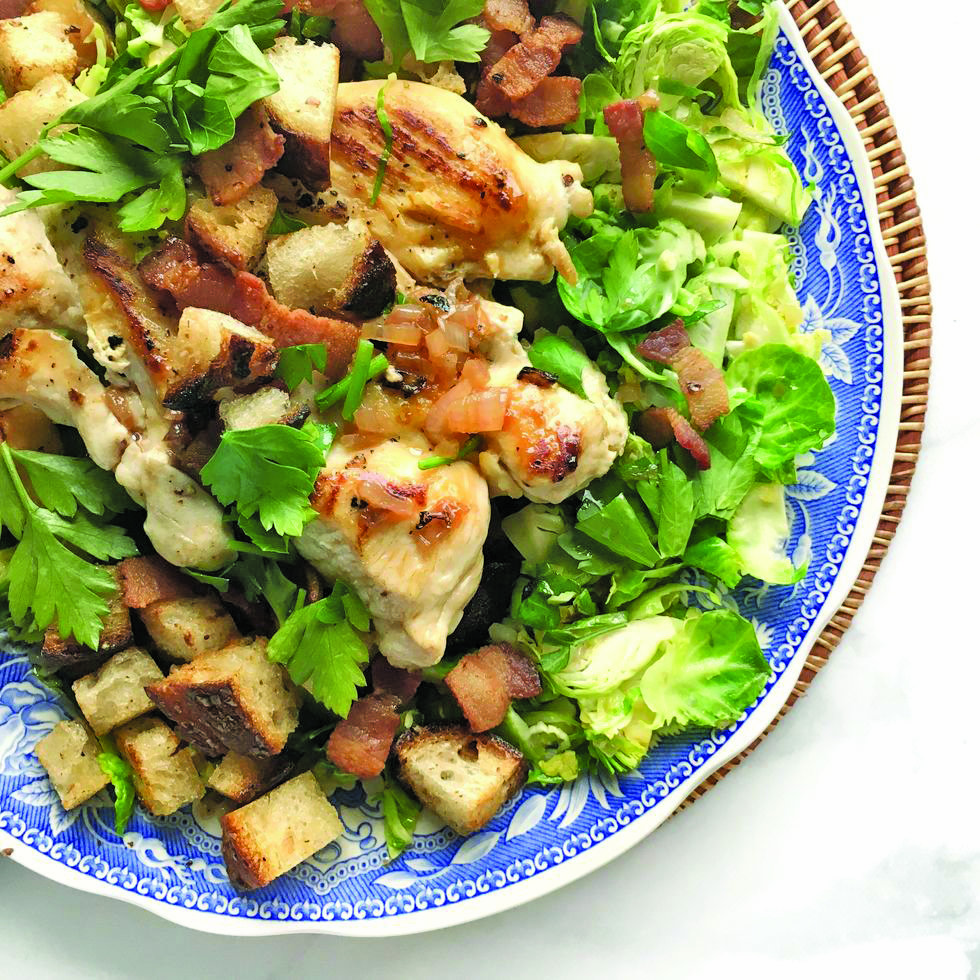 A winter salad entrée gets a touch of warmth with its cooked dressing in this hearty dish.