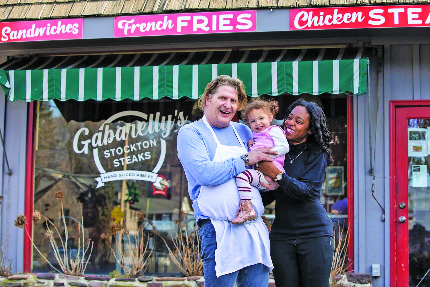 Chef Brian Held, Judith Francois and their daughter, Gabrielle, outside their new restaurant.