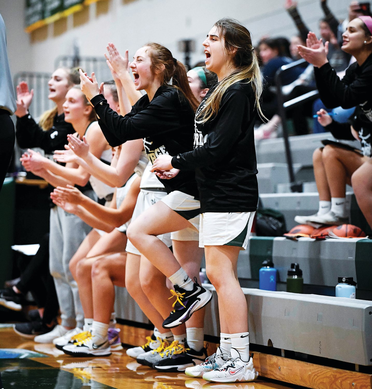 Pennridge’s bench reacts to a 3-pointer from Ella Brown, which blew the game open. Pennridge only held a two-point advantage at the half, 27-25.